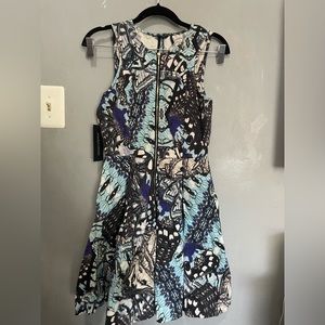 Marciano, pleated a-line, size 6 with pockets